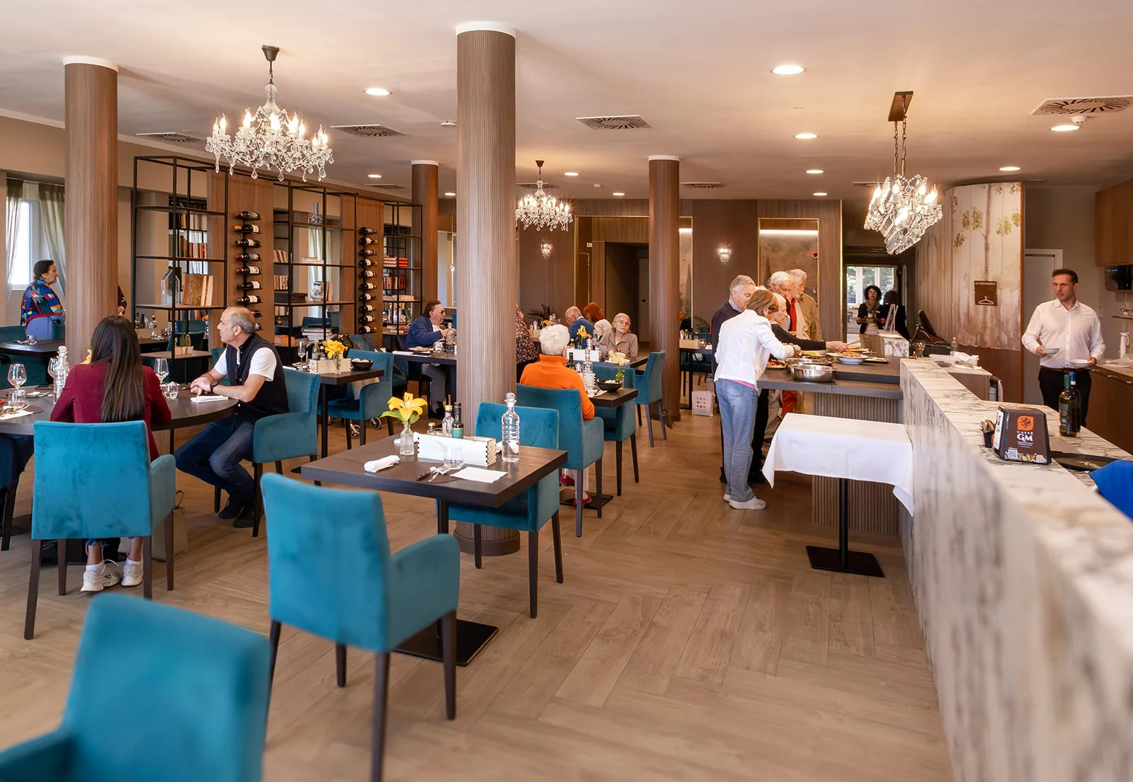 Guests dining together in the Guild Siena restaurant